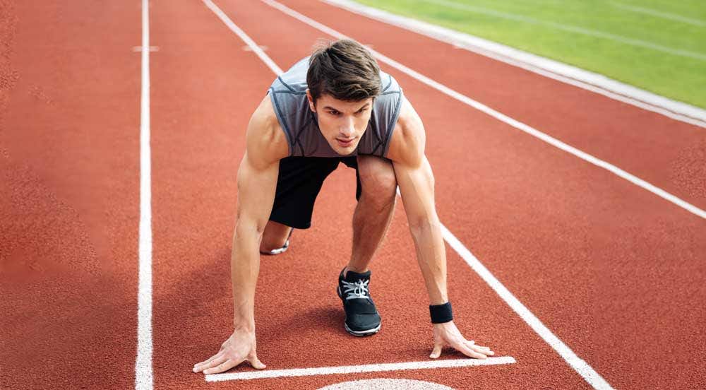 Casa Hiperbárica: atleta profissional de corrida se preparando para dar a largada.